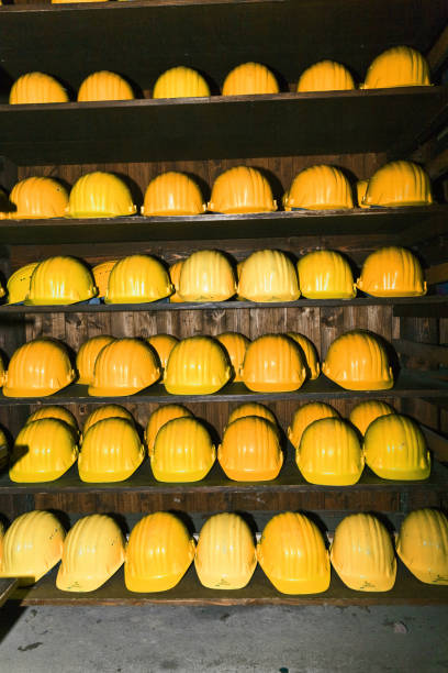 istock yellow helmets for visitors at the gem mine 670140744