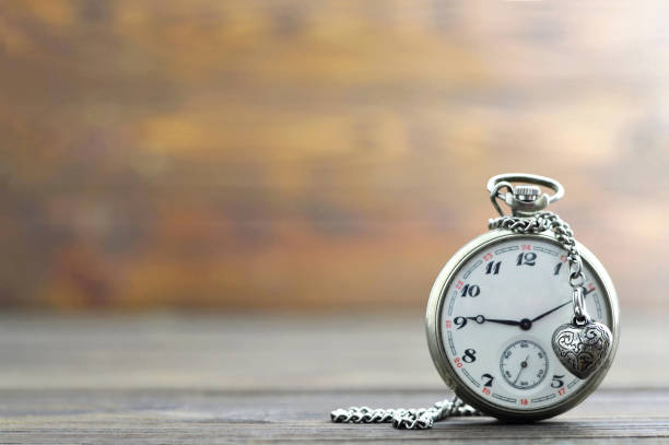 istock Fathers Day gift: Pocket watch and heart pendant 670143476