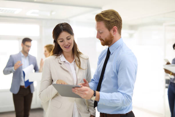 istock Teamwork and technology - Invaluable to modern business 670143930
