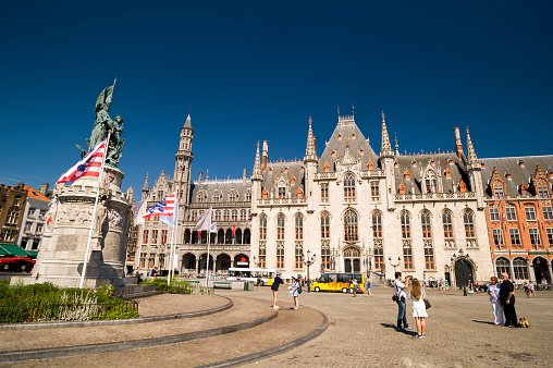 View of the Provincial Palace of Bruges with Monument 'Breydel & De Coninck'