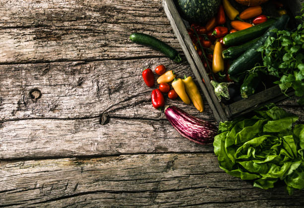 istock Organic vegetables on wood 670150322