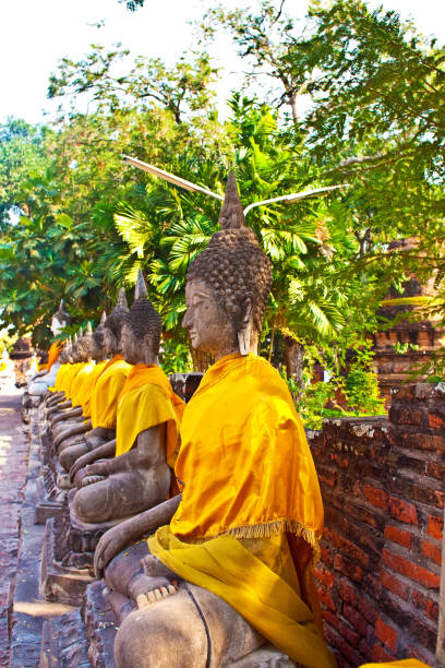 istock beautiful statue of Buddhas in temple Wat Yai Chai Mongkol 670158264