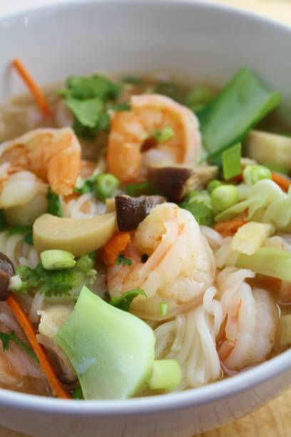 istock Noodle Soup Dish with Fresh Vegetables and Shrimp 670164814