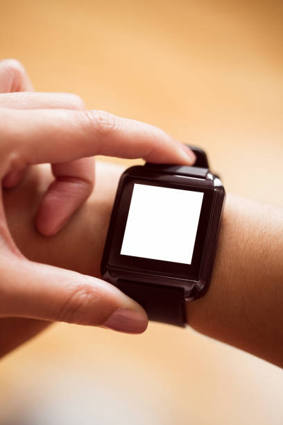istock Asian woman using smart watch with copy space 670164890