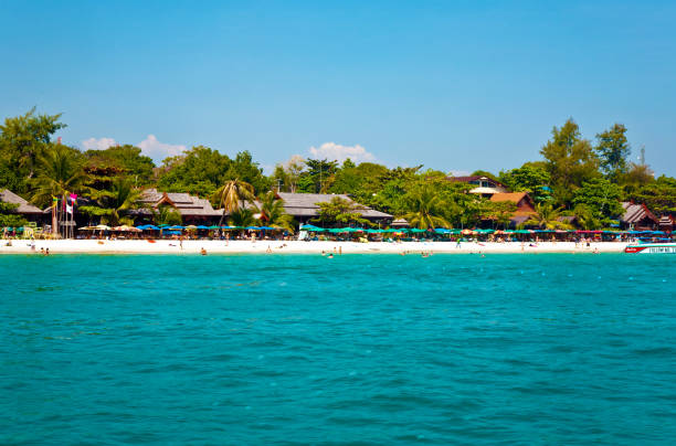 istock beautiful clean sandy  beach from seaside with restaurants seen from speed boat 670165042