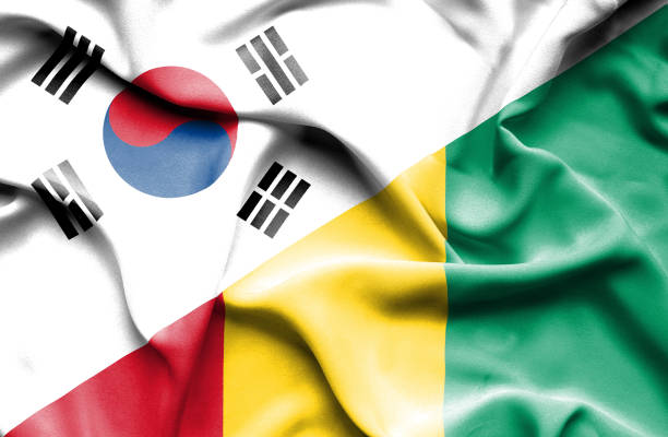 istock Waving flag of Guinea and South Korea 670171430