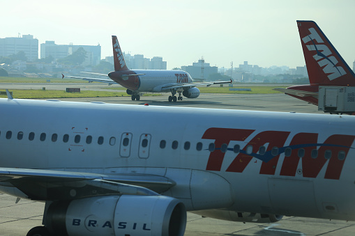 São Paulo, Brazil, February 11, 2017: Airbus from Tam Airline is seen in the courtyard of the Congonhas Airport in the city of Sao Paulo (SP), Brazil. The company flies to major airports in Brazil and the world. (ISTOCK / Joá Souza).