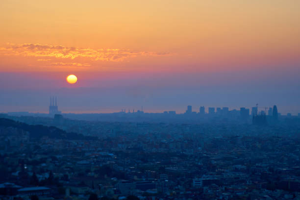 istock Barcelona's sunrise a foggy day 670191336