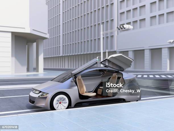 Silver Autonomous Car Parking At The Side Of The Road Stock Photo - Download Image Now