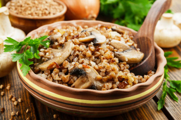 istock Buckwheat porridge with champignons 670212686