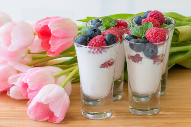 istock Glass with yogurt and berries close up. 670232644