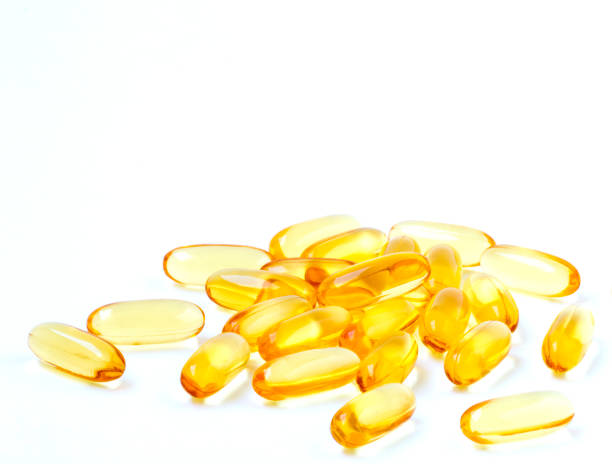 istock Fish oil, omega 3 and vitamin D capsules. 670235550
