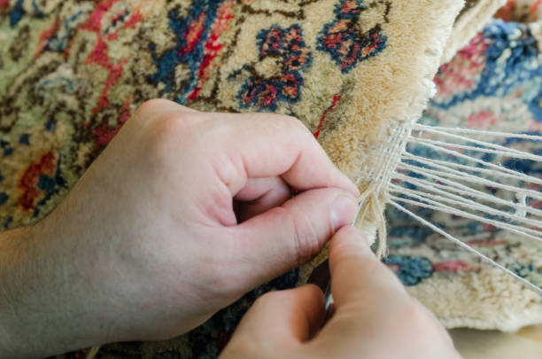 istock Rug fringes repair 670235786