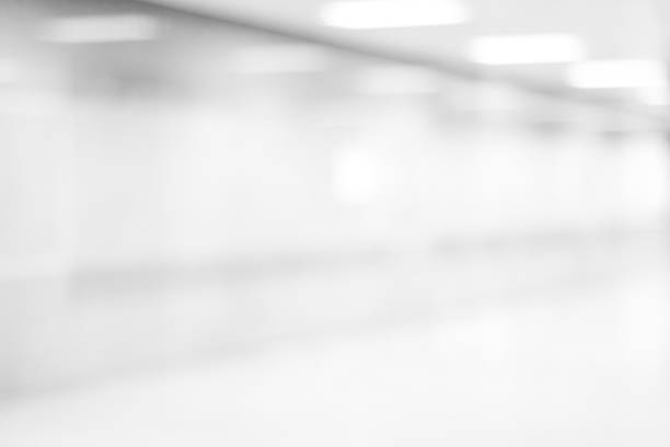 istock Blur inside office building with bokeh light background, business background 670240228