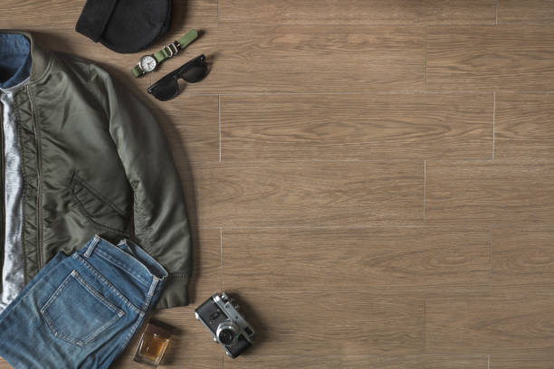istock Top View of Outfit on Wood Background with Copy Space 670243374
