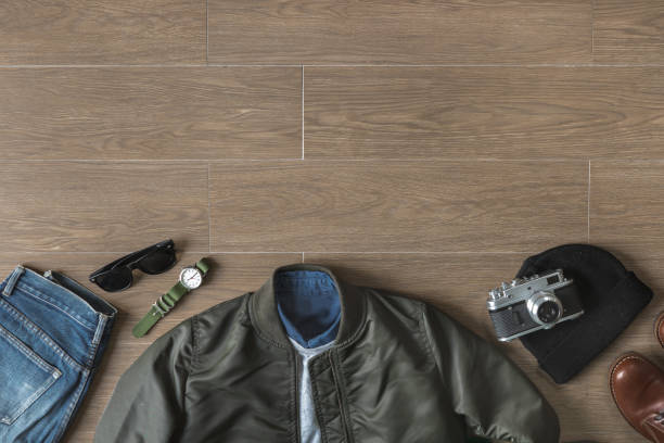 istock Top View of Outfit on Wood Background with Copy Space 670243402