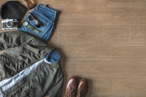 istock Top View of Outfit on Wood Background with Copy Space 670243408