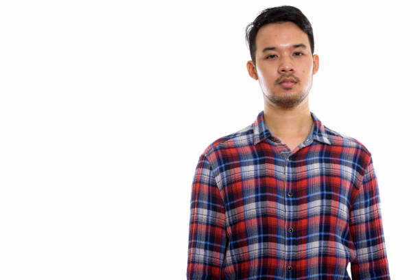 istock Studio shot of young Asian man 670247066