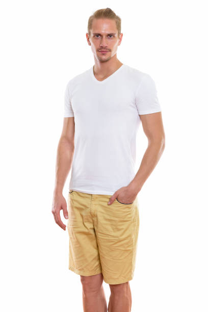 istock Studio shot of young handsome man standing with hand on pocket 670254704