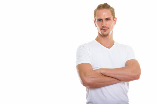 istock Studio shot of young handsome man with arms crossed 670254724
