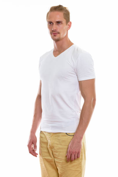 istock Studio shot of young handsome man standing while thinking and looking at distance 670254824