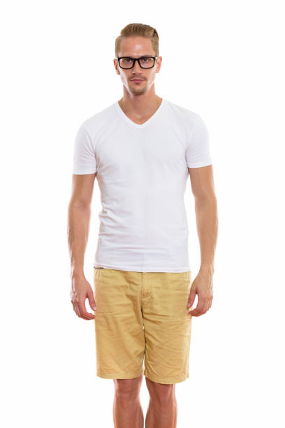 istock Studio shot of young handsome man standing while wearing eyeglasses 670255056