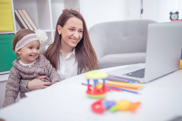 istock Baby and mum at home 670255096