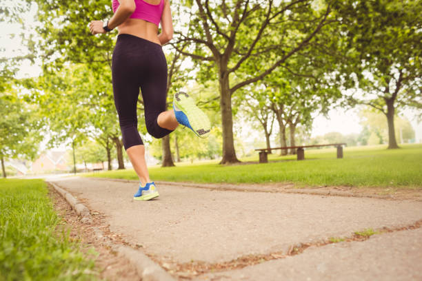 istock Low section of woman in park 670255692