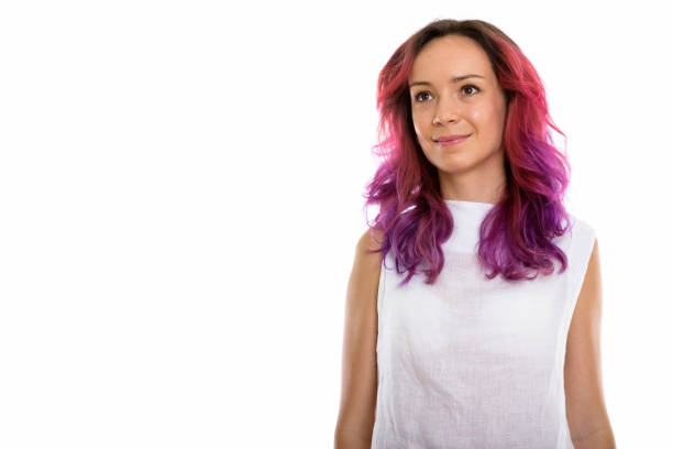 istock Studio shot of young beautiful woman thinking while looking up 670258710