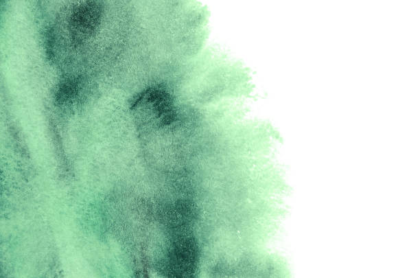 istock Green watercolor on paper 670259218