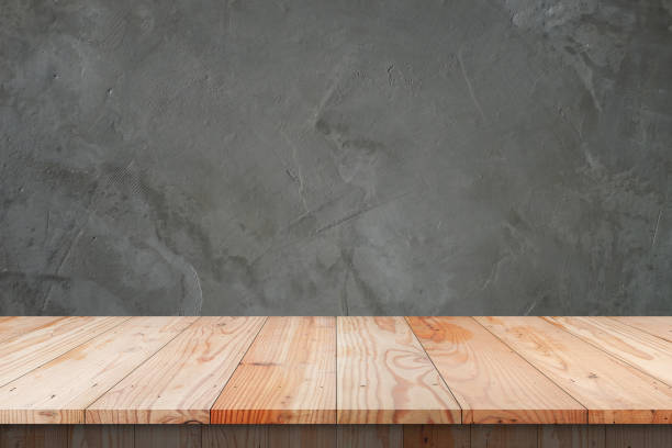 istock Empty top shelves or table wood on concrete wall background.For put product and some thing 670262500