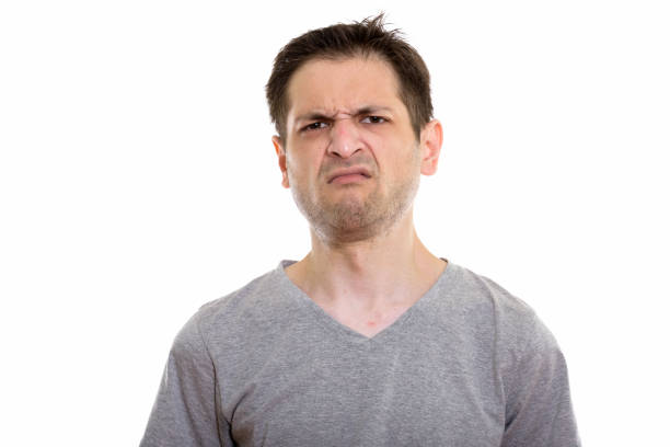 istock Studio shot of young man looking disgusted 670272056