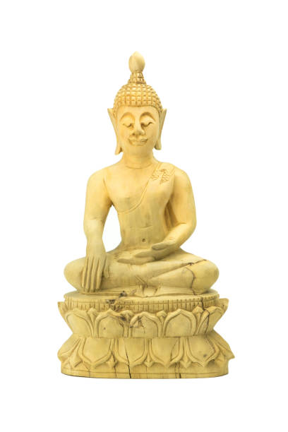 istock wood buddha statue on a white background. 670272630