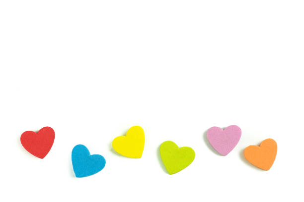 Foam heart shapes on white background as design for Valentine's Day.