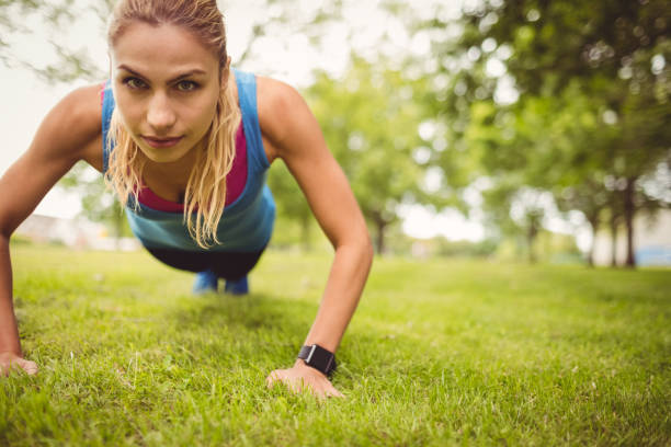 istock Portrait of woman doing exercise 670276110