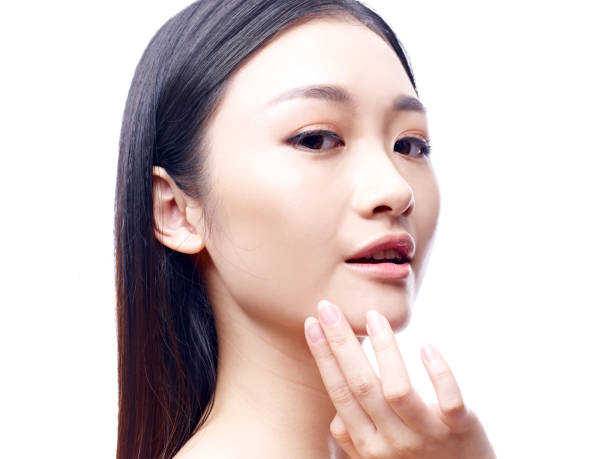 istock beautiful young asian woman 670280036
