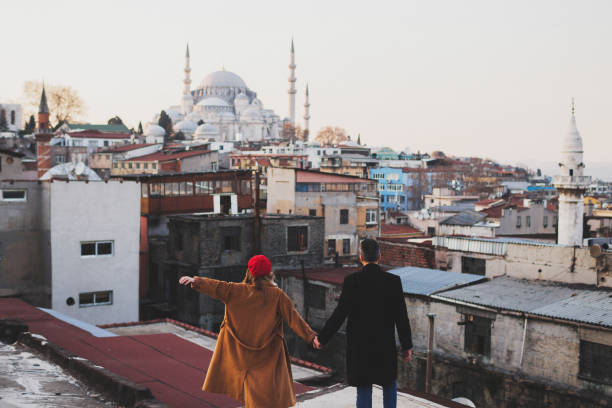 couple in love walking on the roof of grand bazaar in old city istanbul - sexual issues sexual activity couple tan imagens e fotografias de stock