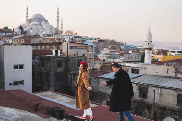 couple in love walking on the roof of grand bazaar in old city istanbul - sexual issues sexual activity couple tan imagens e fotografias de stock