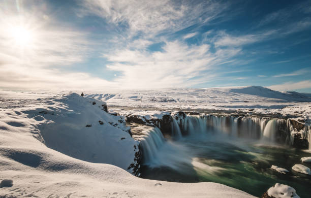 istock Landscaped, Godafoss water fall at winter in Iceland with bright sunlight 670280694
