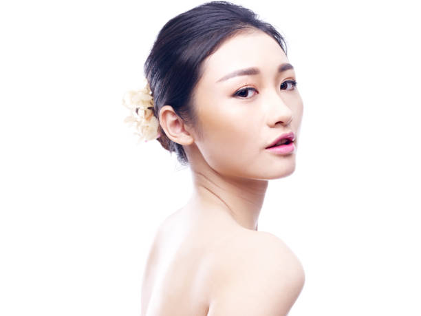 istock beautiful young asian woman 670280978