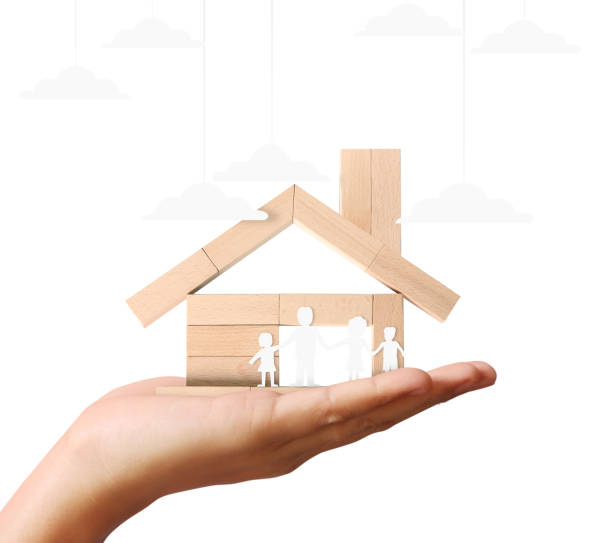 istock Mortgage concept by house from in hand 670291884