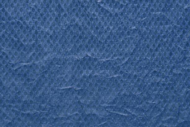 istock Pattern of grunge wrinkled kraft paper and plastic tissue 670308990