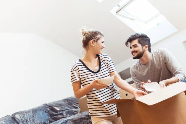 istock Young couple moving into their new home 670310116