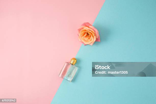 Cosmetics On Modern Colorful Background Stock Photo - Download Image Now - Perfume, Bottle, Pink Color