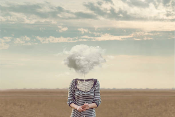 cabeza de mujer sustituido por una suave nube - invisible fotografías e imágenes de stock
