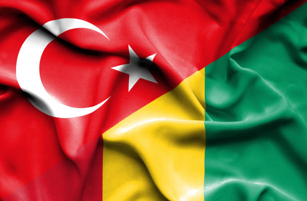 istock Waving flag of Guinea and Turkey 670314154