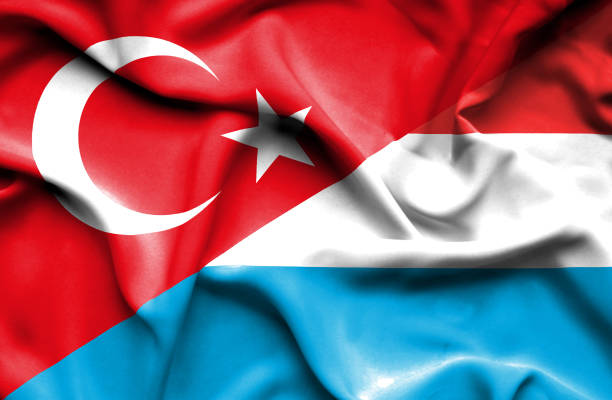 istock Waving flag of Luxembourg and Turkey 670314590