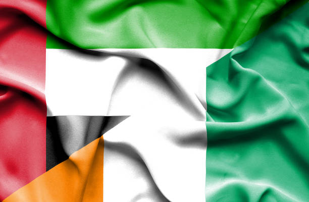 istock Waving flag of Ivory Coast and  United Arab Emirates 670315208