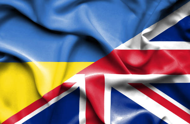 istock Waving flag of United Kingdon and Ukraine 670320282
