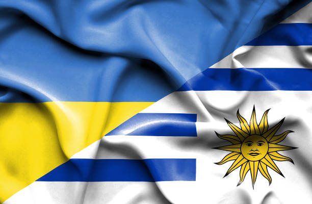 istock Waving flag of Uruguay and Ukraine 670320290